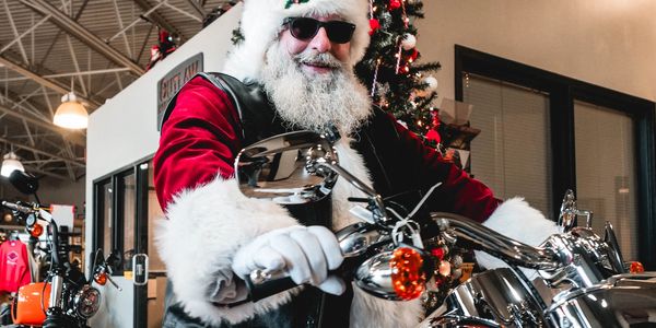 Santa riding motorcycle. 