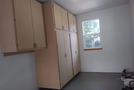 3 ft deep custom cabinets in Natural MDF finish.