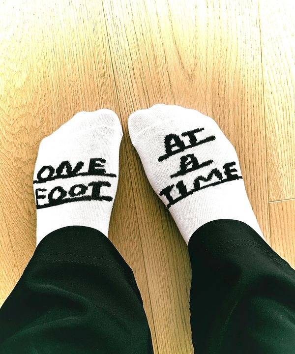 One foot at a time socks 