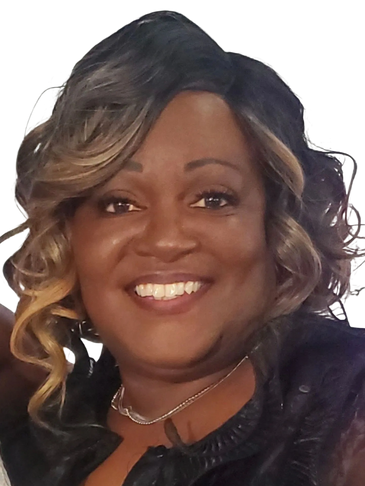 Smiling woman with curly highlighted hair and a black jacket.