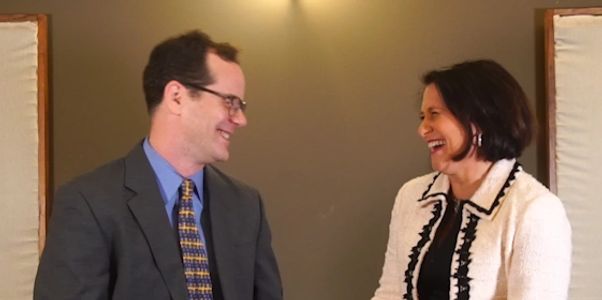 Sean McGarry as Dr. Nathan Goldenwise and Tracy Treger as talk show host Rhoda Nesbit.