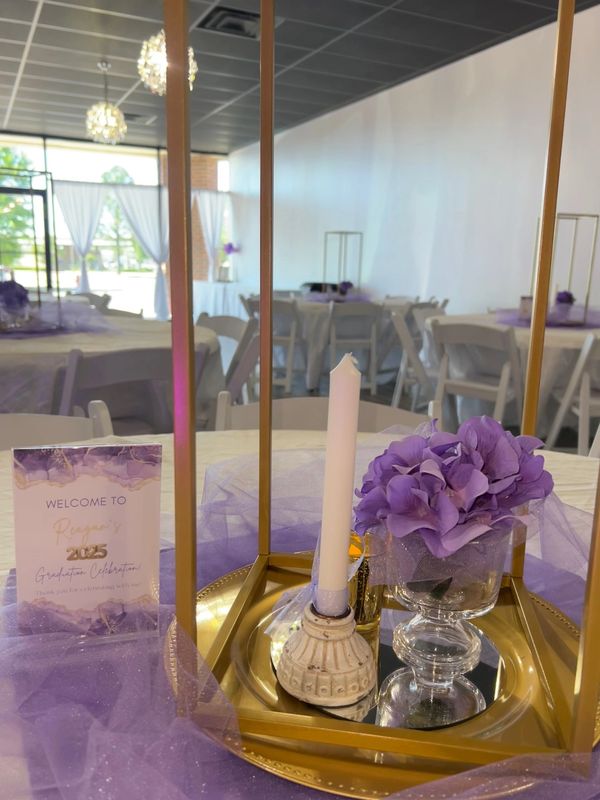 Purple and white centerpieces at Suite Events venue in Broken Arrow.
