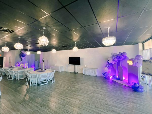 Graduation celebration at Suite Events in purple and white.