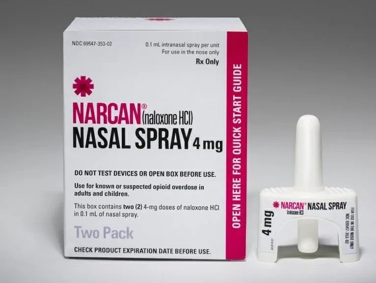 Narcan nasal spray box and device for opioid overdose treatment.