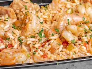 Close-up of shrimp and rice dish.