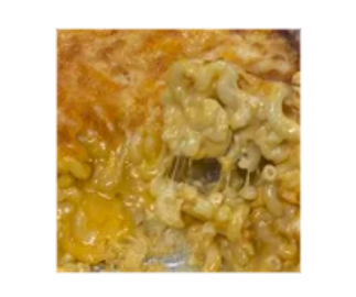 Close-up of cheesy baked macaroni.