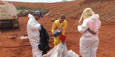Karst hydrologist conducting fluorescent dye trace for landfill permitting.