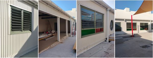 Exterior shots of a building under construction with windows and patio area.