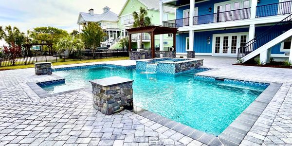 Concrete Pool and Spa With Outdoor Kitchen & Pergola