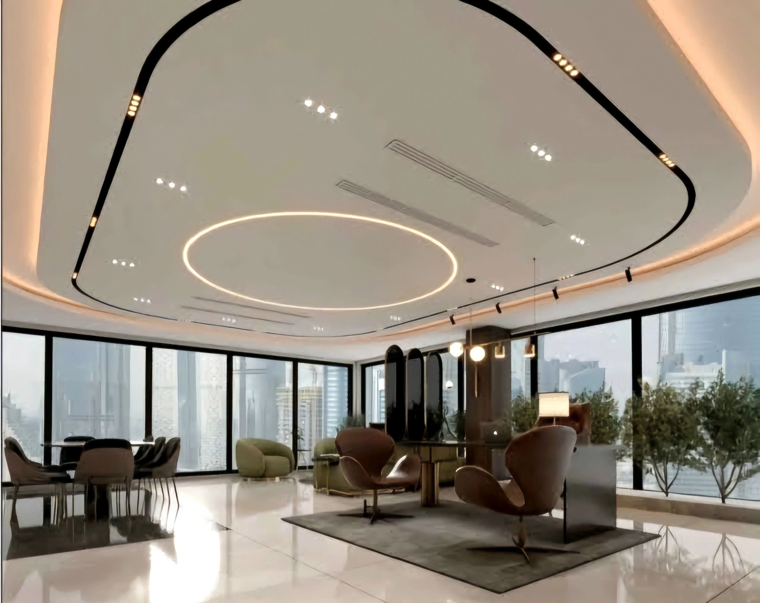 Modern office space with unique ceiling lighting and large windows.