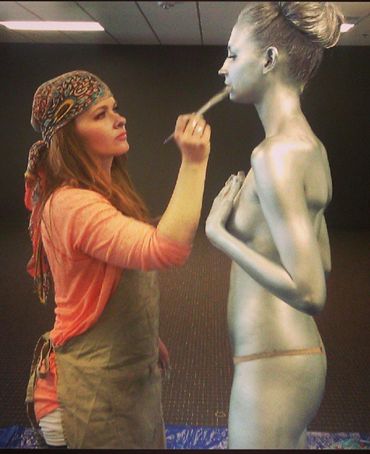 BTS one of the many times I painted girls to look like metallic statues for an event