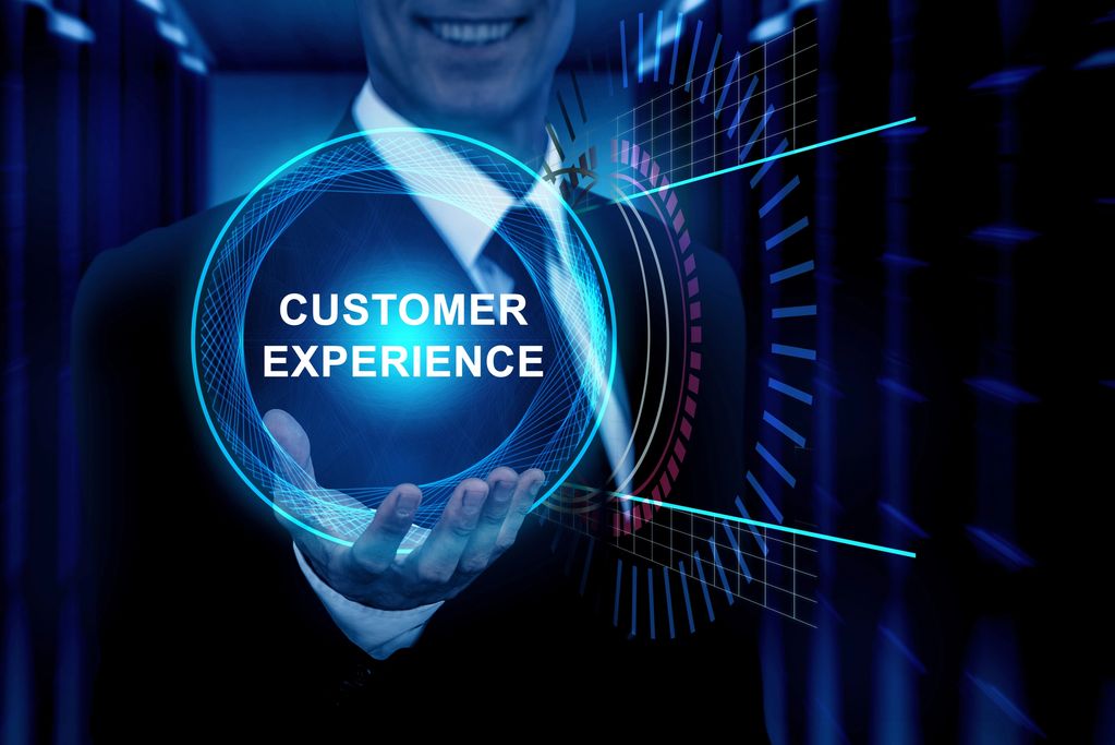 Businessman presenting a holographic display of customer experience.