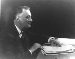 President Roosevelt signing EWC legislation.