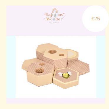 Wooden honeycomb-shaped stacking toy with bee design priced at £25.