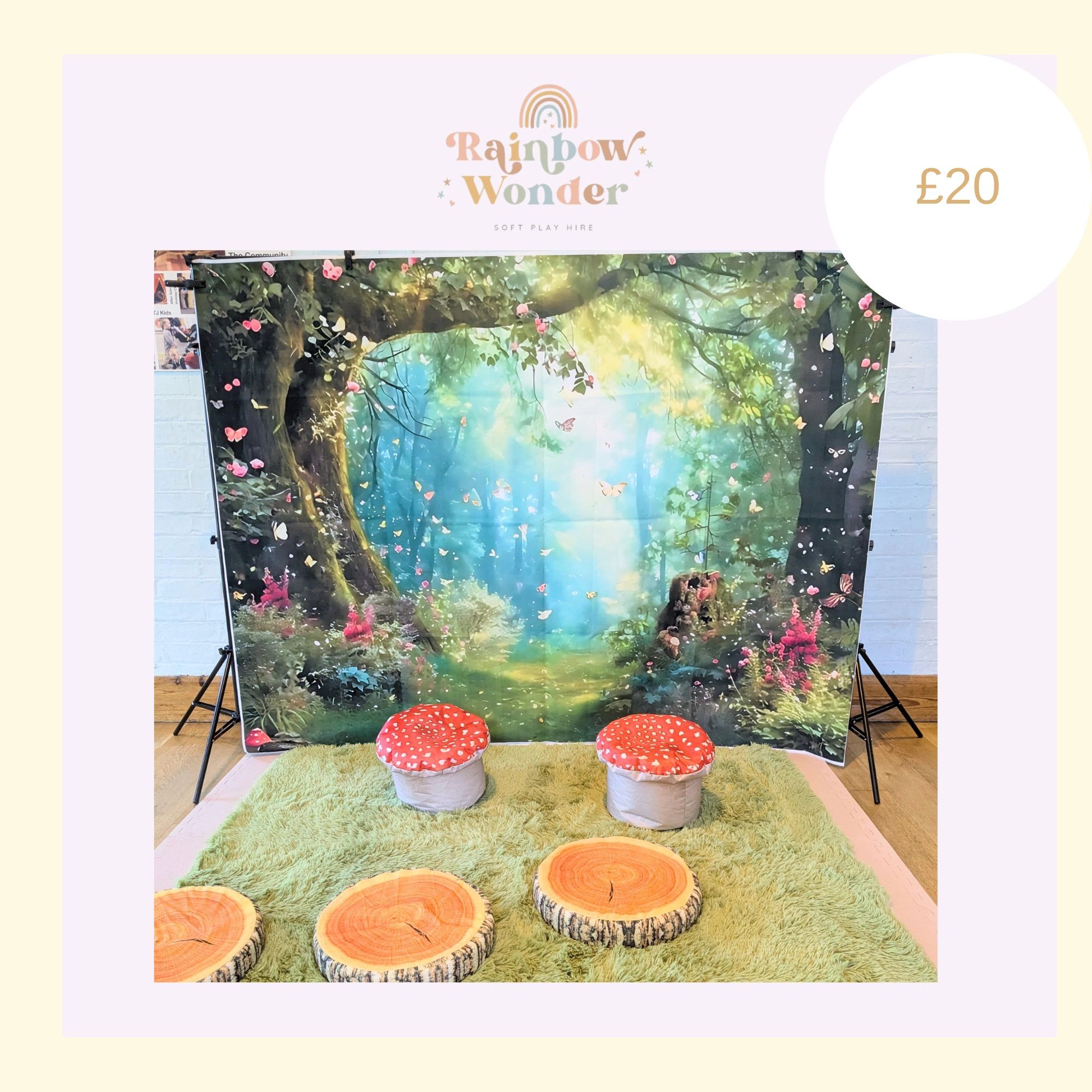 Children's soft play area with a whimsical forest backdrop and mushroom stools.