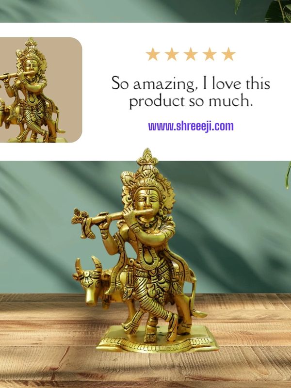 Golden Krishna statue playing flute with a cow, praised in a 5-star review.
