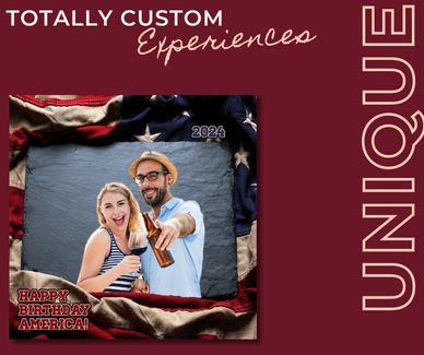 A young couple using a holiday photo booth at a 4th of July Party with an American flag theme.  4th 