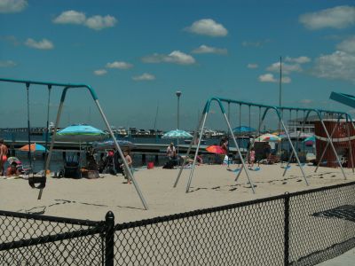 Swing sets on the guarded beach