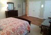 Large master bedroom w futon couch