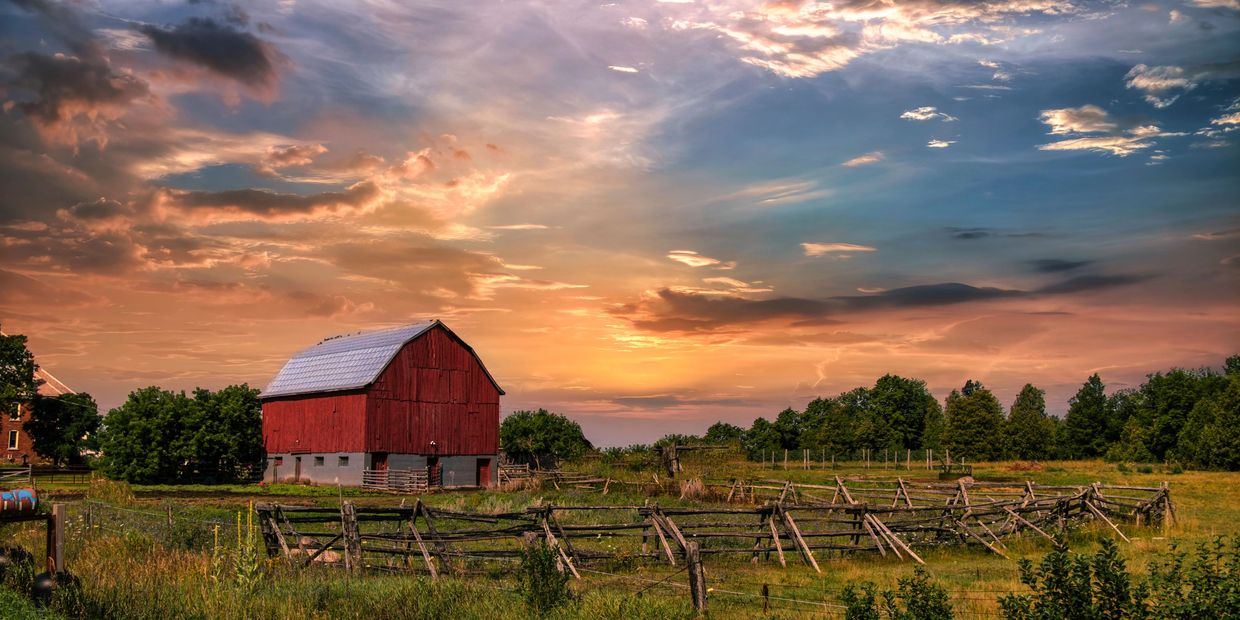 Barn with sun background