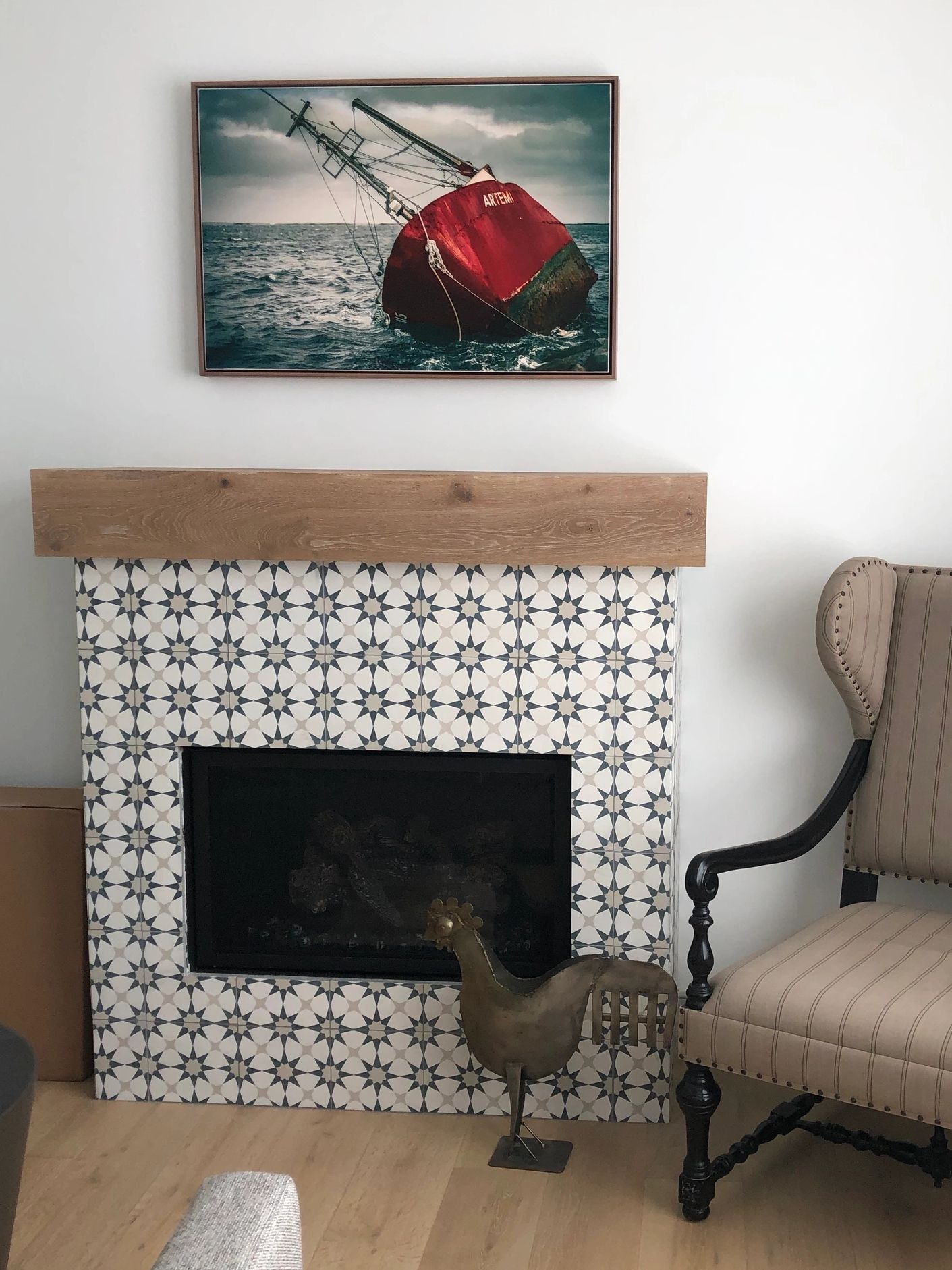 {"blocks":[{"key":"9pk19","text":"Hand painted hand made cement tiles from Mexico offered even more brilliance to this fireplace than the flame itself. ","type":"unstyled","depth":0,"inlineStyleRanges":[],"entityRanges":[],"data":{}}],"entityMap":{}}