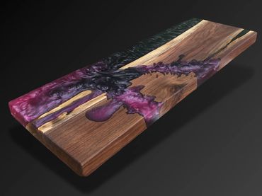 the black and magenta river table console table