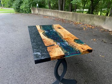 The spalted maple river table with black epoxy a fantastic desk river table