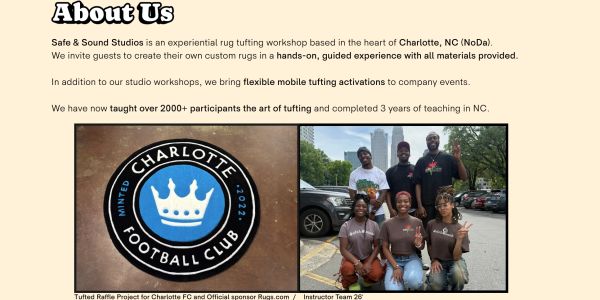 Studio team with Charlotte Football Club raffle sign.