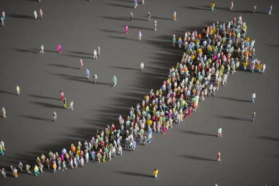 Crowd forming an upward arrow shape.