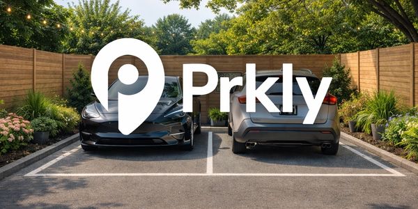 Two parked cars with logo