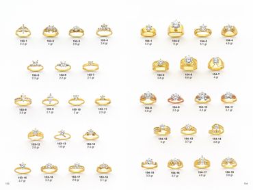 Collection of elegant gold rings with various diamond designs displayed in rows.
