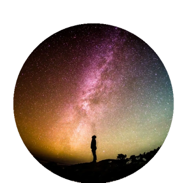 Silhouette gazing at the Milky Way at night.