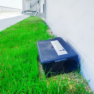 Rat rodenticide bait box on commercial premises