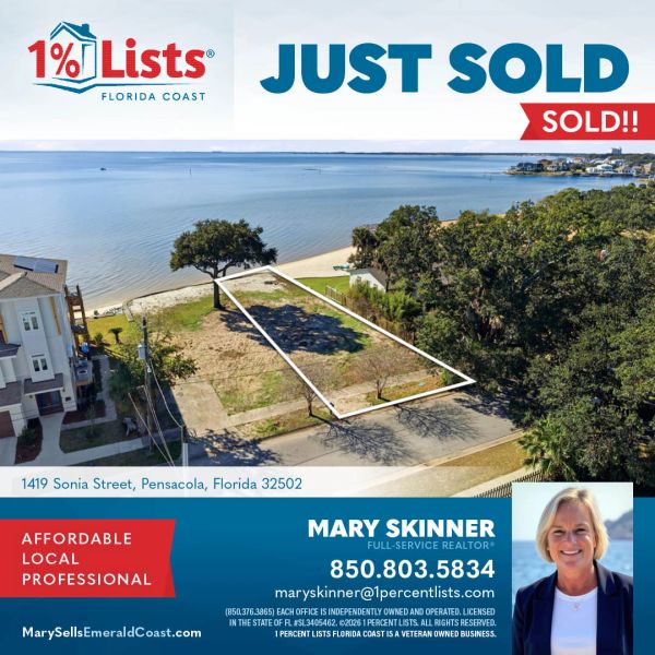 A vacant coastal lot in Pensacola just sold, advertised by realtor Mary Skinner.