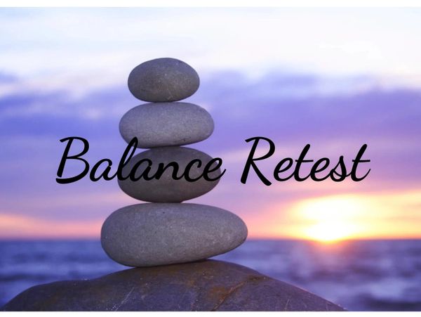 Stacked stones with 'Balance Retest' text and a sunset background.