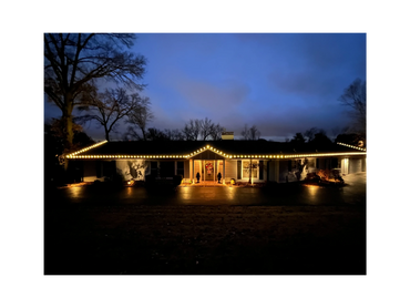 House with Christmas Lights on it