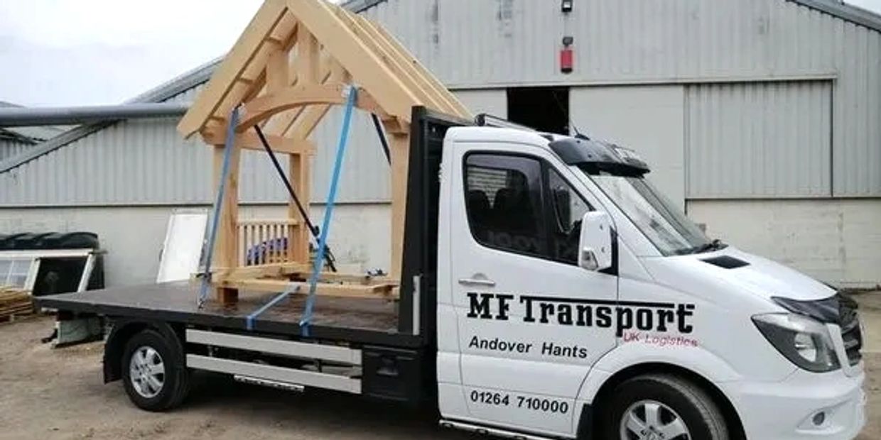 Big car transporting wood
