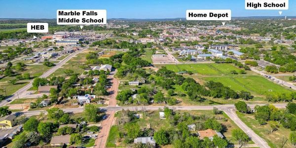 Aerial view of Marble Falls, Texas, showing shopping, restaurants and everyday conveniences near Marble Falls RV Park.