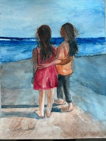 Watercolor painting of two women embracing by the ocean.