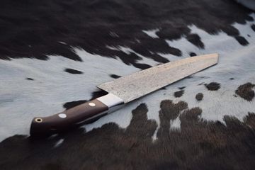 HandMade Chef Knife
Made of High Carbon Steel
Overall length is 12" inches
Handle material is Wood.