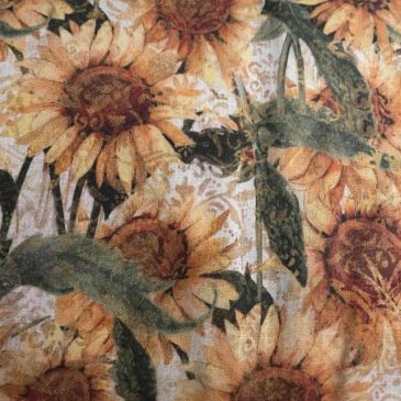 Pattern of sunflowers with large green leaves.