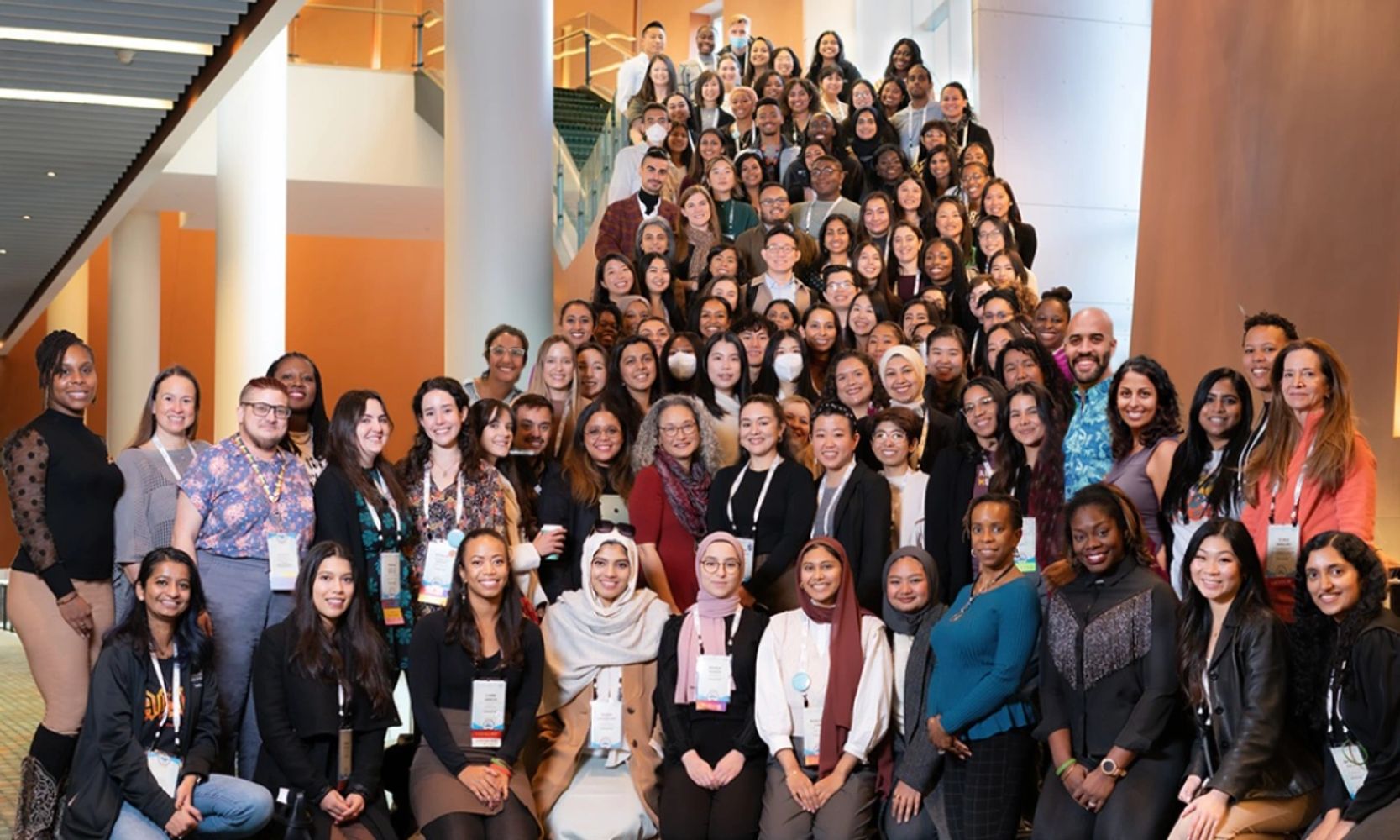 A large & diverse group of genetic counselors & genetic counseling students together at a conference