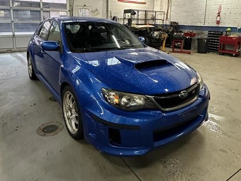 Front passenger-side view of 2011 Subaru WRX used cars for sale Blue Eyes Auto Vancouver