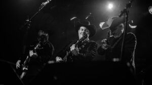 Johnny Cash tribute band performs on stage.