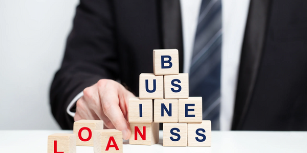 Business Loans and Man with blocks