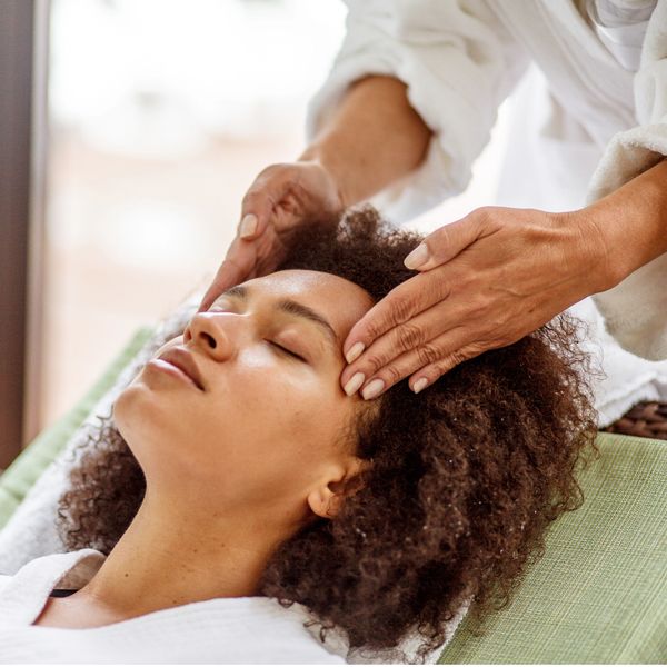 woman receiving access bars therapy