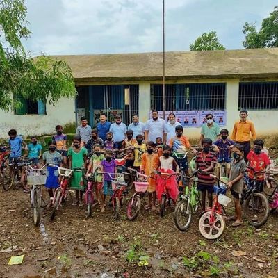 Distribution of bicycles in tribal village,