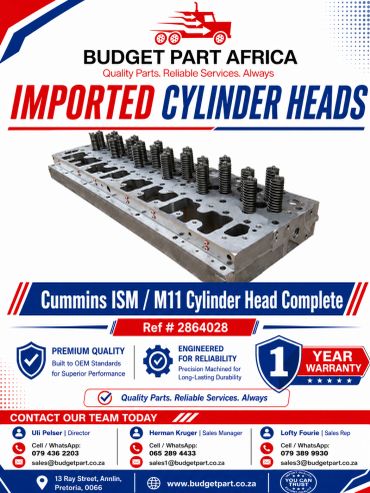 Advertisement for imported Cummins ISM/M11 cylinder head with warranty.