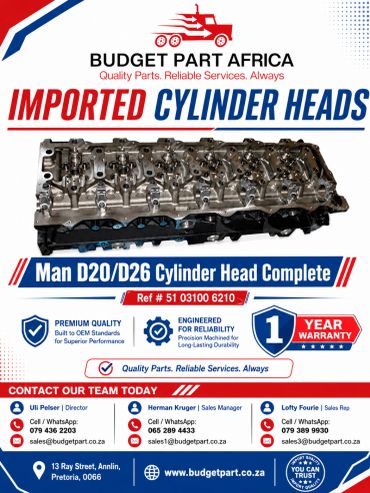 Advertisement for imported cylinder heads with contact details and warranty.