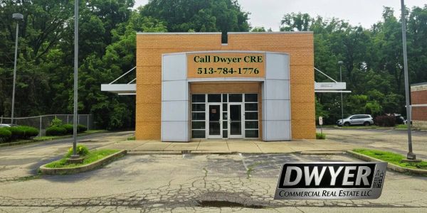 Commercial building with Dwyer Real Estate sign.